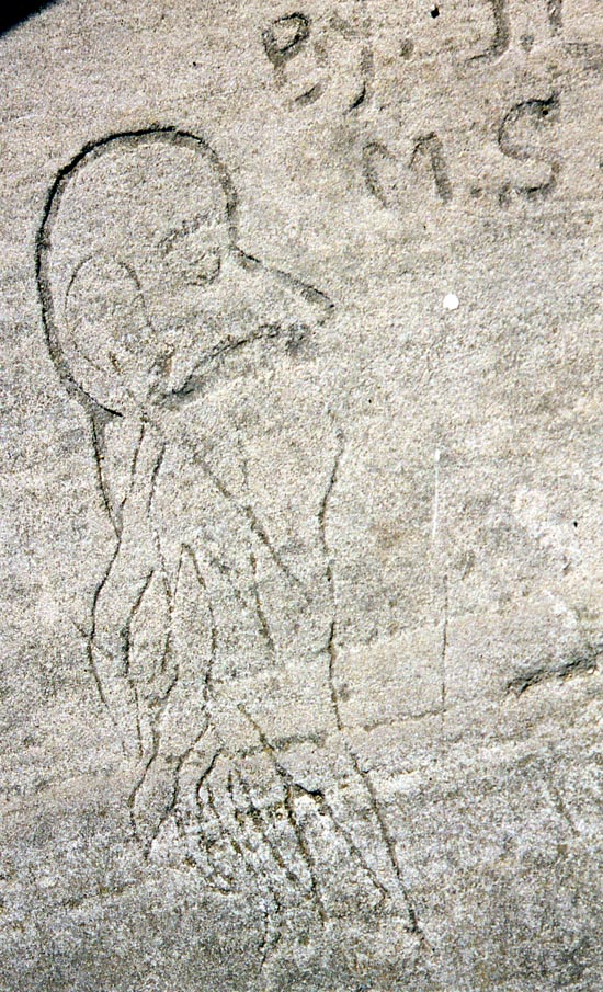 Lakefront carving: Bearded man