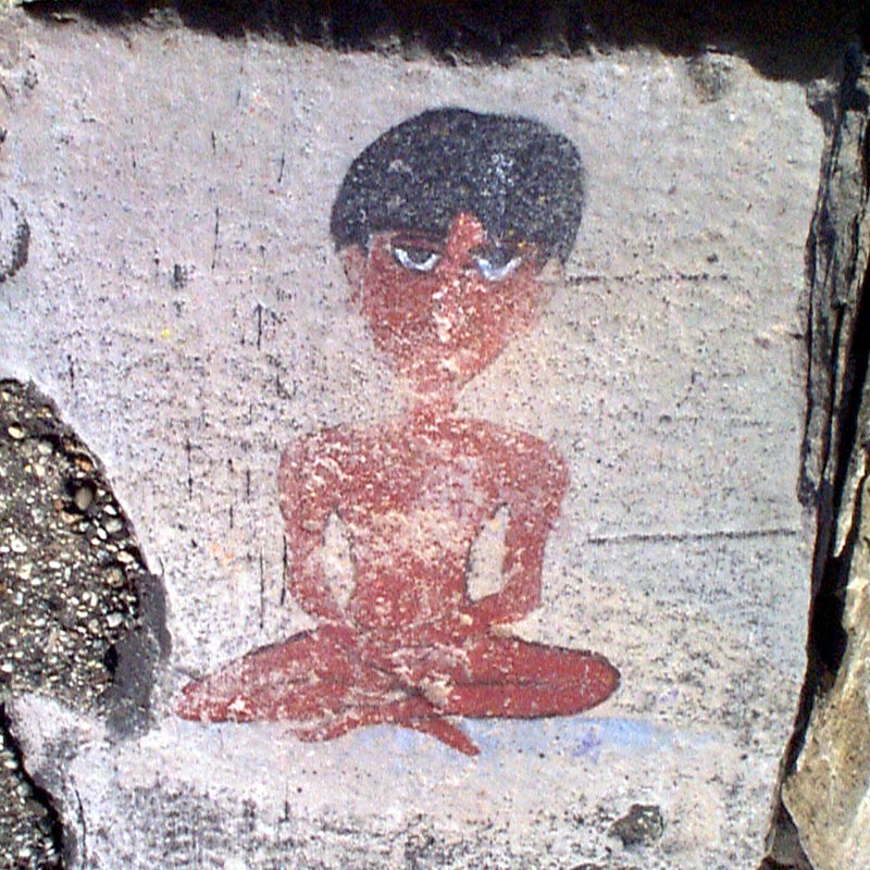 Lakefront carving: Seated figure