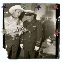 Roy Rogers and Joe "40,000" Murphy. Like all the photos, this was once part of a photospread that consumed much of Murphy's house as well as a five-car garage across the street.