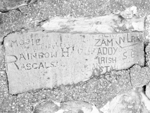 Autograph rock: The Rainbow Rascals at Morgan Shoal, hearted by Mogie. You'll also find Pickles, H, Zam, Addy, Irish, Jean, Stahl, NLR and S.B., with dozens of other names carved into rocks nearby  Chicago lakefront stone carvings, between 45th Street and Hyde Park Blvd. 2019