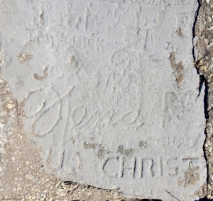 Autograph rock detail with Christ and more. Chicago lakefront stone carvings, between 45th Street and Hyde Park Blvd. 2018