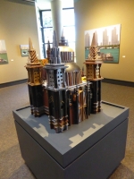 Constructions from found wood and tin signs by Tim Bruce, at the South Shore Arts Gallery, Munster, Indiana