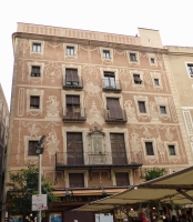 Casa del Gremi dels Revenedors. This building was erected in 1685 and remodeled in 1781, when the sgraffito was added