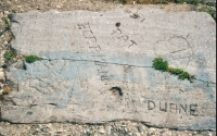 1951, Pat Herrmann and Duane, heart, fancy X (or a jack). Chicago lakefront stone carvings between Belmont and Diversey Harbors. 2002