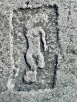 Standing bathing beauty. Lost.  Chicago lakefront stone carvings between Belmont and Diversey Harbors.  2003