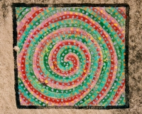 Spiral. Chicago lakefront stone paintings, between Belmont and Diversey Harbors. 2002