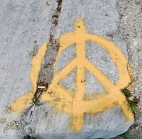 Sloppy peace sign. Chicago lakefront stone paintings, Diversey Harbor. 2017