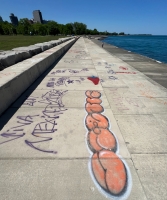 Fresh graffiti. Chicago lakefront stone writing, between Belmont and Diversey Harbors. 2022