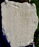 Autograph rock: '39, C.E., Whiz, CB, HB + in partial heart, AE, AS, BM, Joel N Kate and others. Chicago lakefront stone carvings, between Belmont and Diversey Harbors. 2015