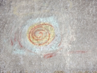 Spiral. Chicago lakefront stone paintings, between Belmont and Diversey Harbors. 2017