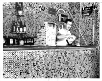Vintage press photo: Practical Use for Used Bottle Caps MIAMI, FLA: Joe Wiser, a disabled World War veteran operating his own inn here, as the unique distinction of having found a use for used bottle caps. As can be seen, he has some fancy interior decorating with them. ACME 4/25/39