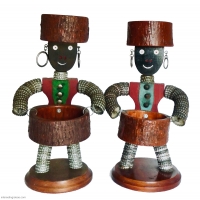 Pair of bottle-cap figures with carved nose and mouth, felt vests and rustic wood bowls - vernacular art Pair of bottle-cap figures with carved nose and mouth, felt vests and rustic wood bowls - vernacular art