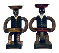 Pair of black seated tallboy bottle-cap figures with painted mouths - vernacular art Pair of black seated tallboy bottle-cap figures with painted mouths - vernacular art
