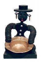 Seated black bottle-cap figure with hat - vernacular art