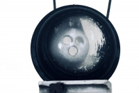Detail of head of bottle-cap figure made with spare electronic parts - vernacular art Detail of head of bottle-cap figure made with spare electronic parts - vernacular art