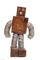 Robot-like brown bottle-cap figure made with rough blocks- vernacular art