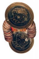 Top view of brown bottle-cap figure with Texas-themed trays standing on a music box - vernacular art Top view of brown bottle-cap figure with Texas-themed trays standing on a music box - vernacular art