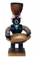 Black bottle-cap figure with applied breasts and painted headscarf - vernacular art Black bottle-cap figure with applied breasts and painted headscarf - vernacular art
