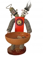 Two-headed bottle-cap figure with orange body