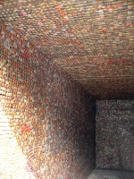 Interior of shed covered  with bottle caps - vernacular art environment