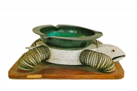 White and green bottle-cap turtle, side view - vernacular art