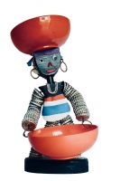 Black figure with colorful smock and signature on bottom - vernacular art