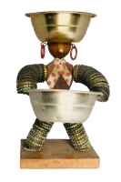 Small brown bottle-cap figure with round head and bow - vernacular art