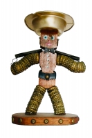 Brown bottle-cap figure with tapered body, painted face, a belt, and a yoke - vernacular art