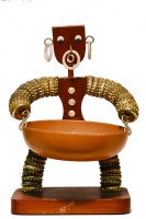 Brown bottle-cap figure with tapered body and one bowl - vernacular art