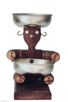 Simple brown seated  bottle-cap figure - vernacular art