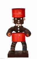 Small black bottle-cap figure with bowtie - vernacular art