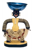 Yellow bottle-cap figure with mesh skirt - vernacular art