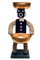 Black bottle-cap figure with incised body and bowtie  - vernacular art
