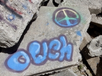 Peace symbol, Ouch, detail. Chicago lakefront paintings, Northerly Island. 2019