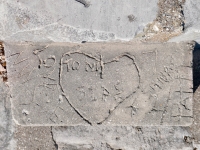 Love NW Side, Tony STPS in heart, arrow, Sandy 4 Patti. Chicago lakefront stone carvings, Calumet Park. 2024 Love NW Side, Tony STPS in heart, arrow, Sandy 4 Patti. Chicago lakefront stone carvings, Calumet Park. 2024