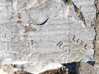 I, Jab(ber?), WE, R.G., ZLFZ. Chicago lakefront stone carvings, Calumet Park. 2024 I, Jab(ber?), WE, R.G., ZLFZ. Chicago lakefront stone carvings, Calumet Park. 2024