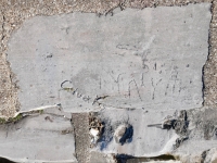 L. + G.D., I., T, Chuck K., RM, Ya\'y, B.G., Benson. Chicago lakefront stone carvings, Calumet Park. 2024 L. + G.D., I., T, Chuck K., RM, Ya\'y, B.G., Benson. Chicago lakefront stone carvings, Calumet Park. 2024