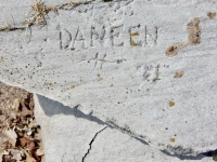 Daneen \"61\", detail. Chicago lakefront stone carvings, Calumet Park. 2019