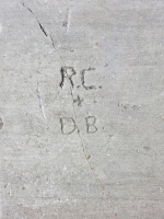 R.C. + D.B in a faint heart, detail. Chicago lakefront stone carvings, Calumet Park. 2019