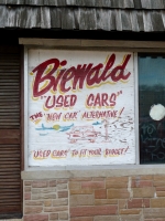 1959 Chevrolet on sign for  Biewald Used Cars, Western Avenue near Touhy-Roadside Art