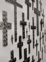 Cross Purposes: Stanley Szwarc at Intuit December 2016. Crosses on wall, side view Cross Purposes: Stanley Szwarc at Intuit December 2016. Crosses on wall, side view