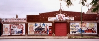 Multiple vignettes on the painted facade of D&A Auto Body Repair at Western Avenue and 47th Street-Roadside Art
