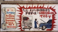 A large stack of text equipment, a mechanic, a vehicle being test and much writing. D&A Auto Body Repair, Western Avenue and 47th Street-Roadside Art