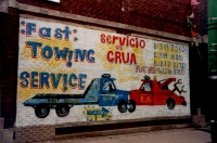 Two tow trucks and much writing. D&A Auto Body Repair, Western Avenue and 47th Street-Roadside Art-Roadside Art Two tow trucks and much writing. D&A Auto Body Repair, Western Avenue and 47th Street-Roadside Art-Roadside Art