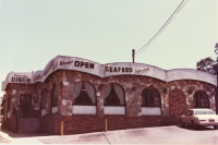 Colonial Diner, Huntington, New York, c. 1985. Now a nail salon, with the swoops and stonework removed.