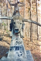 Bull rider. "Do not touch or swing on statues." E.T. Wickham Site, 1993.