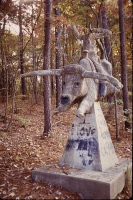 Bull rider. "Do not touch or swing on statues." E.T. Wickham site, 1995.