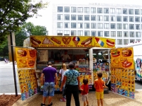 Group waiting to order. Vernacular hand-painted food truck signage, National Mall, Washington, D.C. Group waiting to order. Vernacular hand-painted food truck signage, National Mall, Washington, D.C.