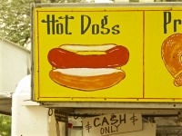 Hot dogs closeup. Vernacular hand-painted food truck signage, National Mall, Washington, D.C. Hot dogs closeup. Vernacular hand-painted food truck signage, National Mall, Washington, D.C.