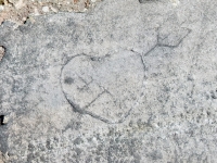 Heart with arrow. Chicago lakefront stone carvings, between Foster Avenue and Montrose. 2018 Heart with arrow. Chicago lakefront stone carvings, between Foster Avenue and Montrose. 2018